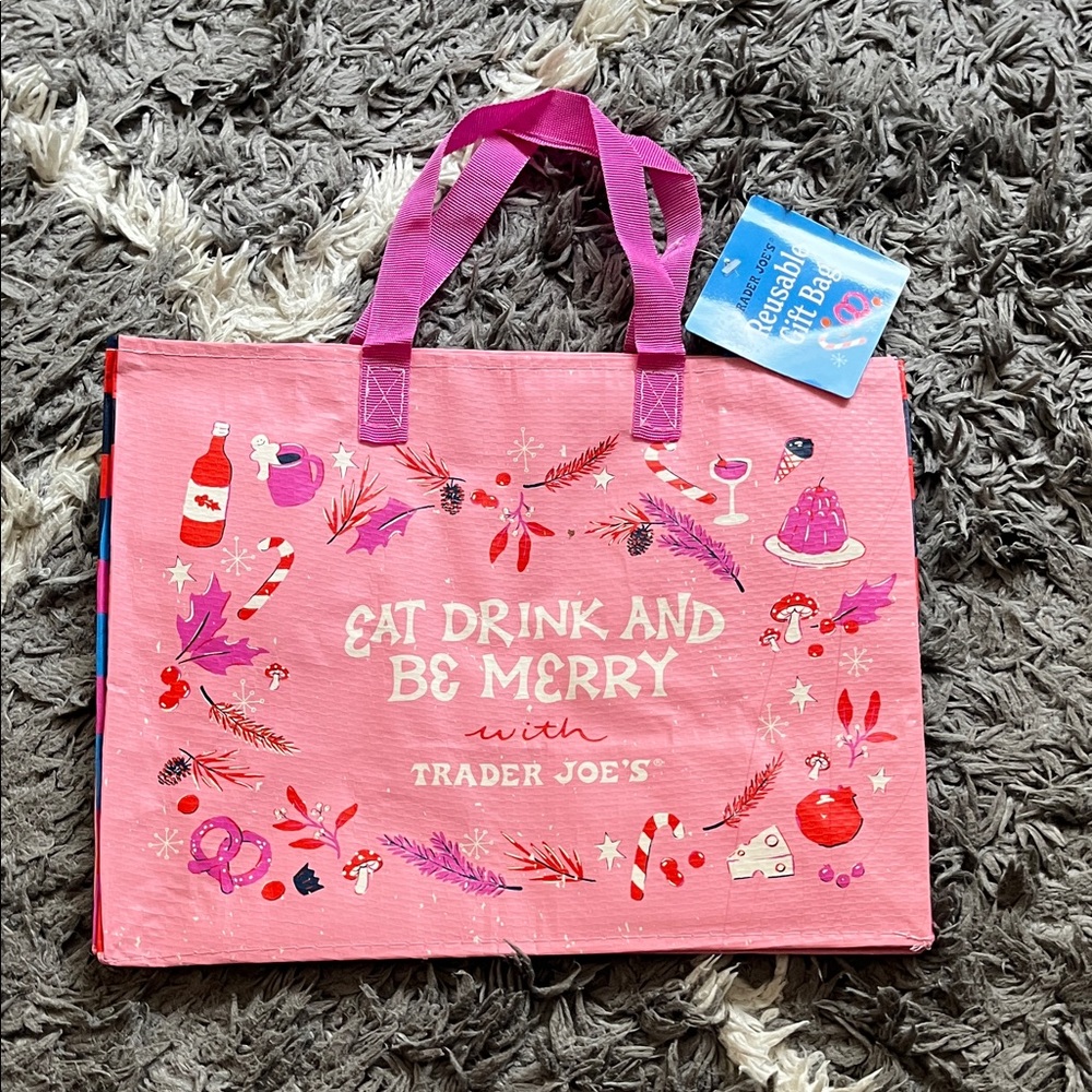 Trader Joe’s reusable gift bag. Pink. New with tag.